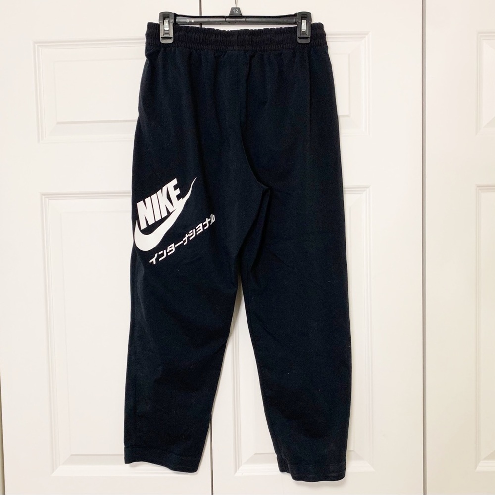 Nike High Waisted Straight Leg Pants in Black Size Medium
